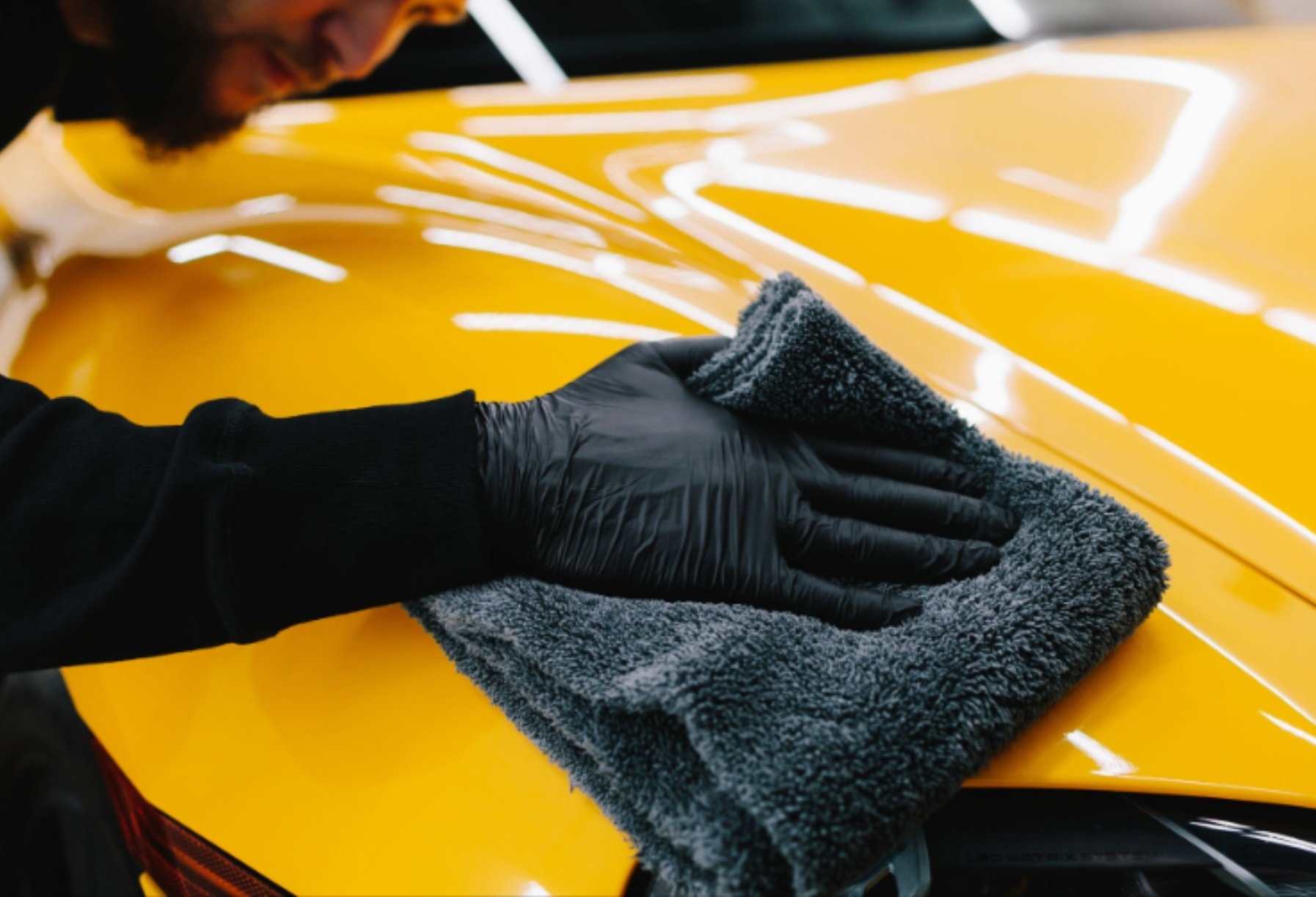 Professional detailer at work